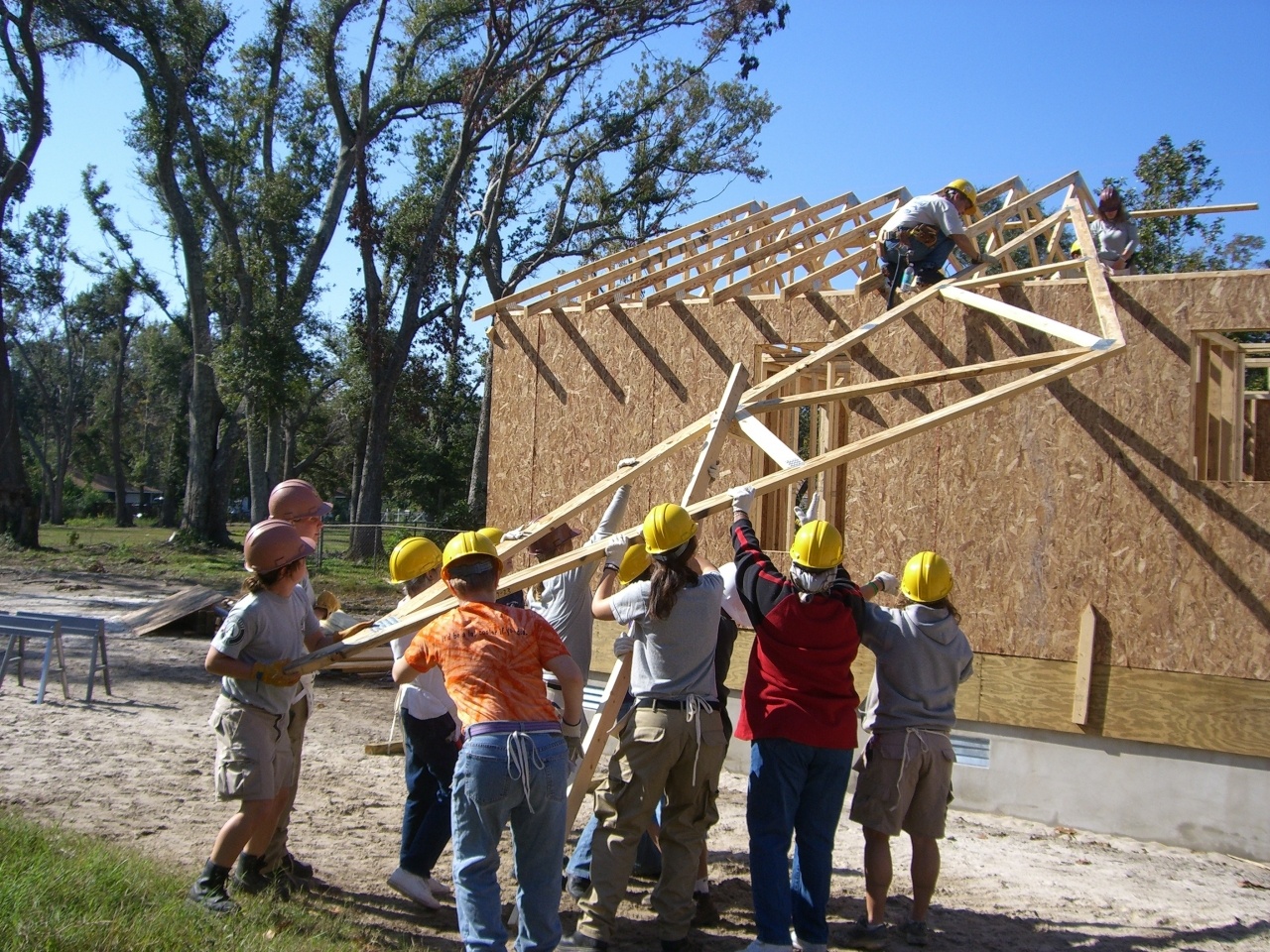 Volunteers Install Roof Framing