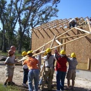 Volunteers Install Roof Framing