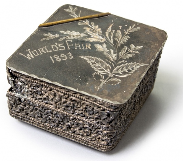 Metal box documenting a World's Fair, circa 1893